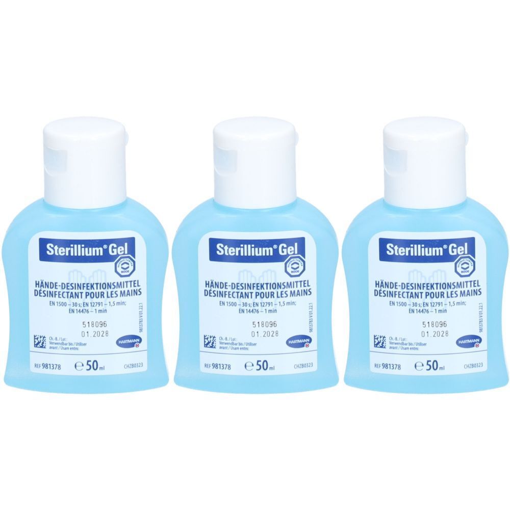 Trois flacons de gel désinfectant pour les mains Sterillium. Flacons bleus avec bouchon blanc. Inscription : Désinfectant pour les mains.