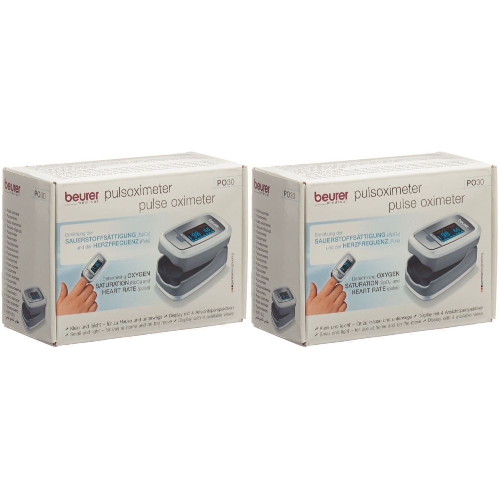 Deux boîtes de produit Beurer Pulsoximeter P030. Inscriptions : saturation en oxygène, fréquence cardiaque, marque.
