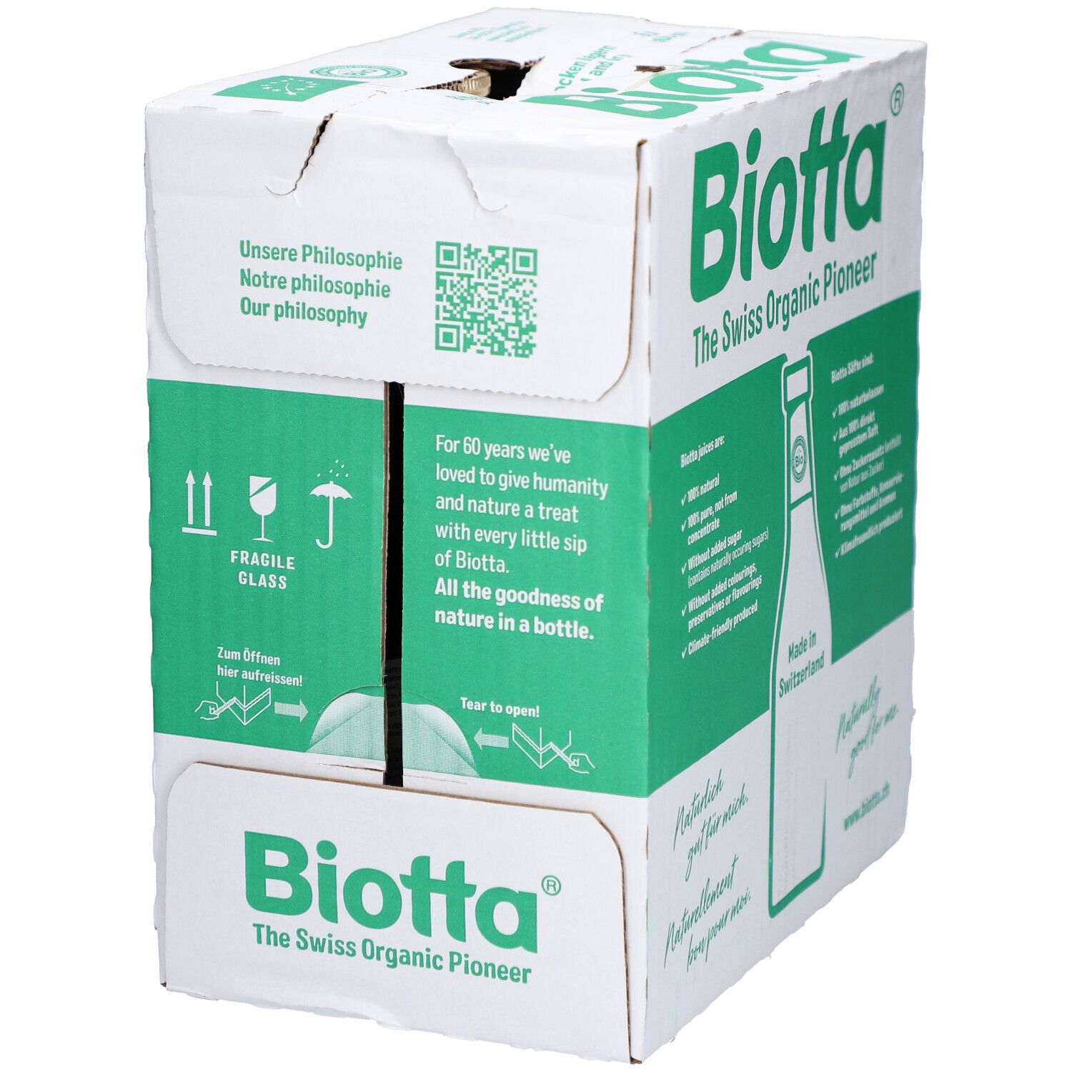 Karton mit Biotta-Logo und Text. Enthält Informationen über das Produkt und die Marke. Aufdruck: "The Swiss Organic Pioneer".