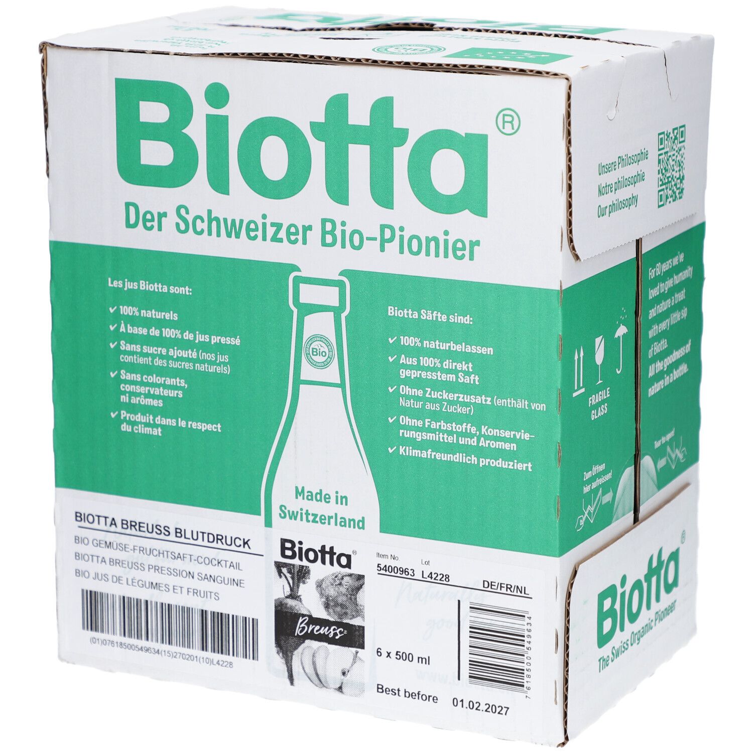 Carton Biotta. Contient 6 bouteilles de 500 ml. Inscriptions en allemand, français et néerlandais. Marque de certification bio.
