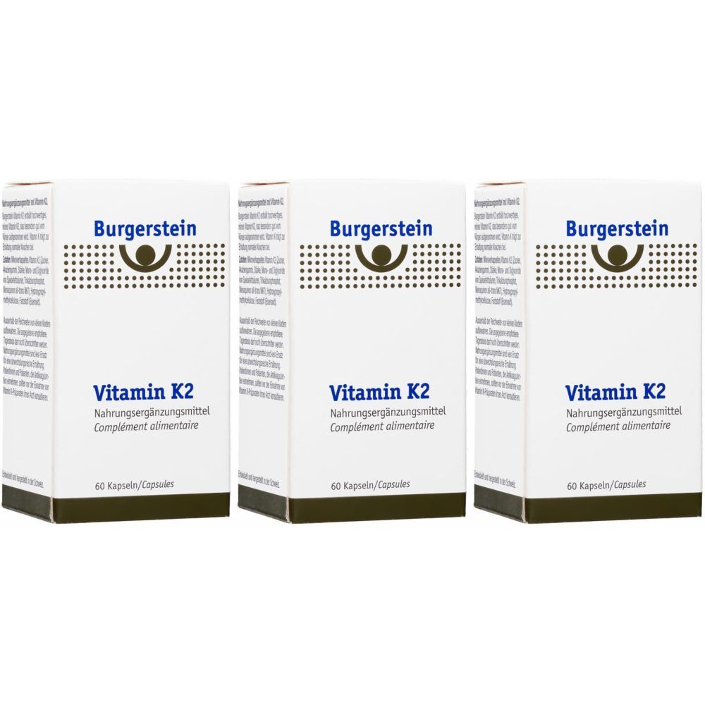 Drei Schachteln Burgerstein Vitamin K2. Aufschrift: Vitamin K2 Nahrungsergänzungsmittel, 60 Kapseln.