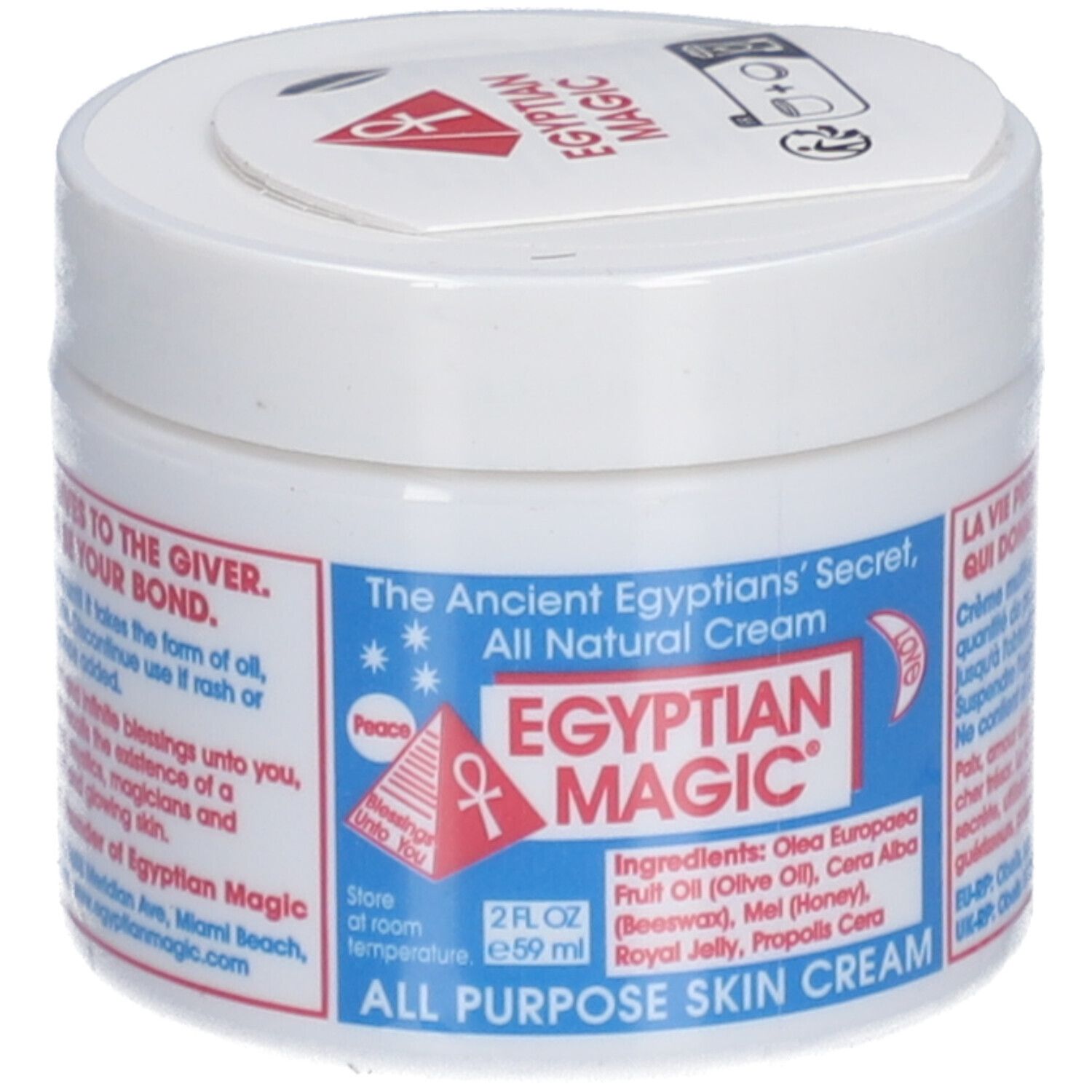 Weißer Tiegel mit blauem Etikett. Aufschrift: Egyptian Magic, All Purpose Skin Cream. Deckel mit Aufkleber.