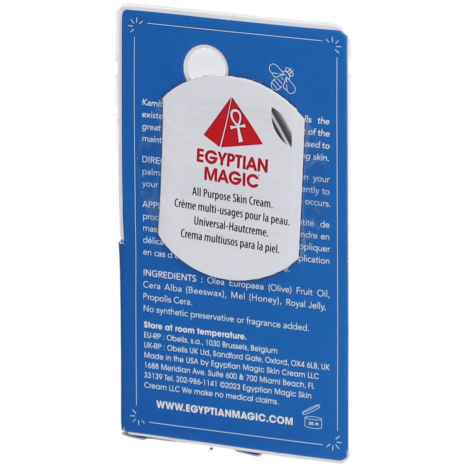 Rückseite eines blauen Karton-Displays. Text: Egyptian Magic, All Purpose Skin Cream. Inhaltsstoffe, Anwendungshinweise.
