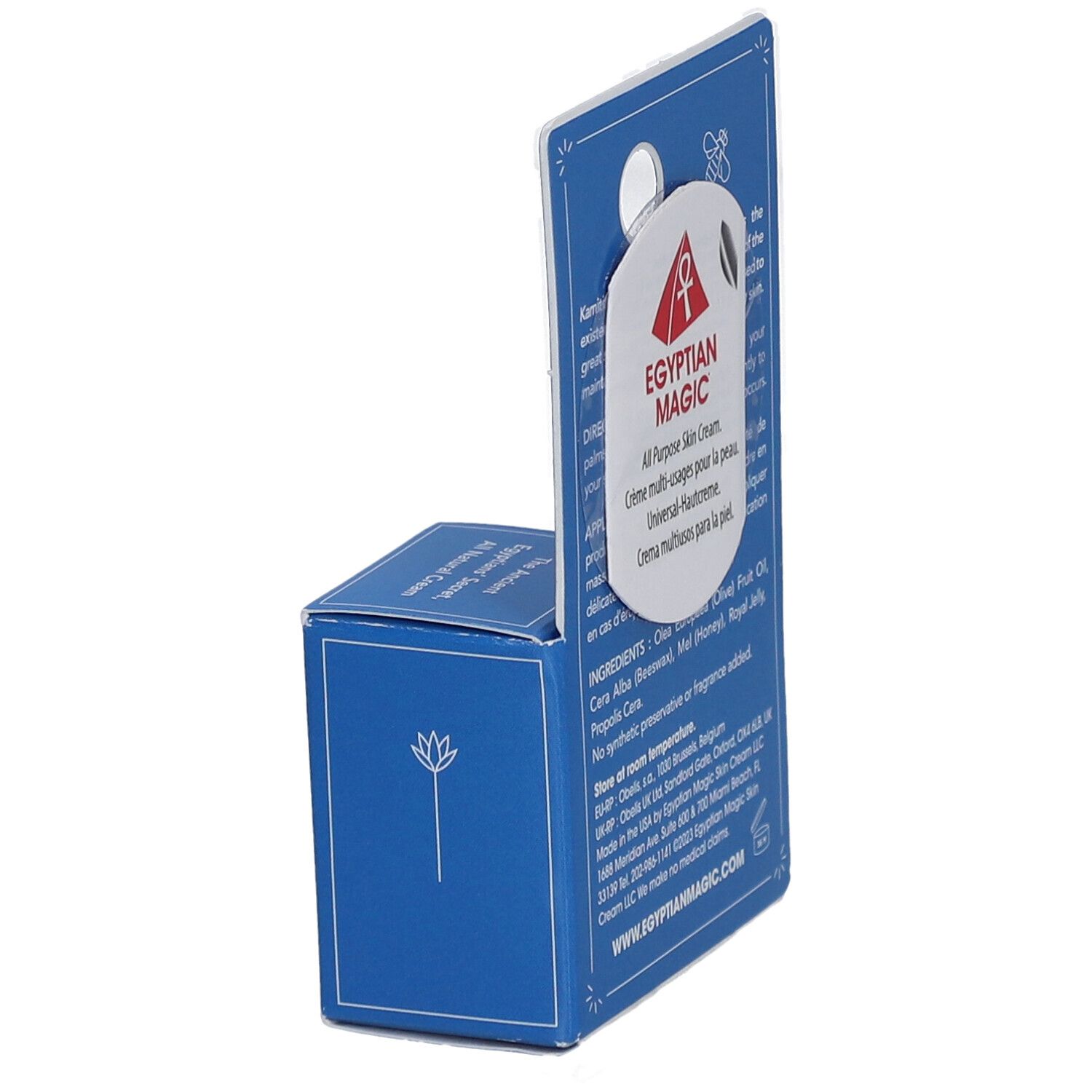 Blaues Karton-Display mit Creme. Aufschrift: Egyptian Magic, All Purpose Skin Cream. Rückseite mit Text und Logo.