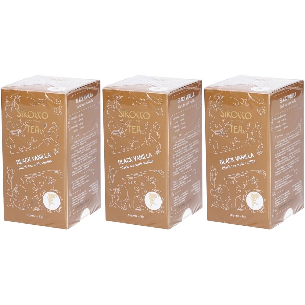 Drei Schachteln Tee. Aufschrift: Schirokko Tea, Black Vanilla. Goldfarbene Verpackung mit floralen Elementen.