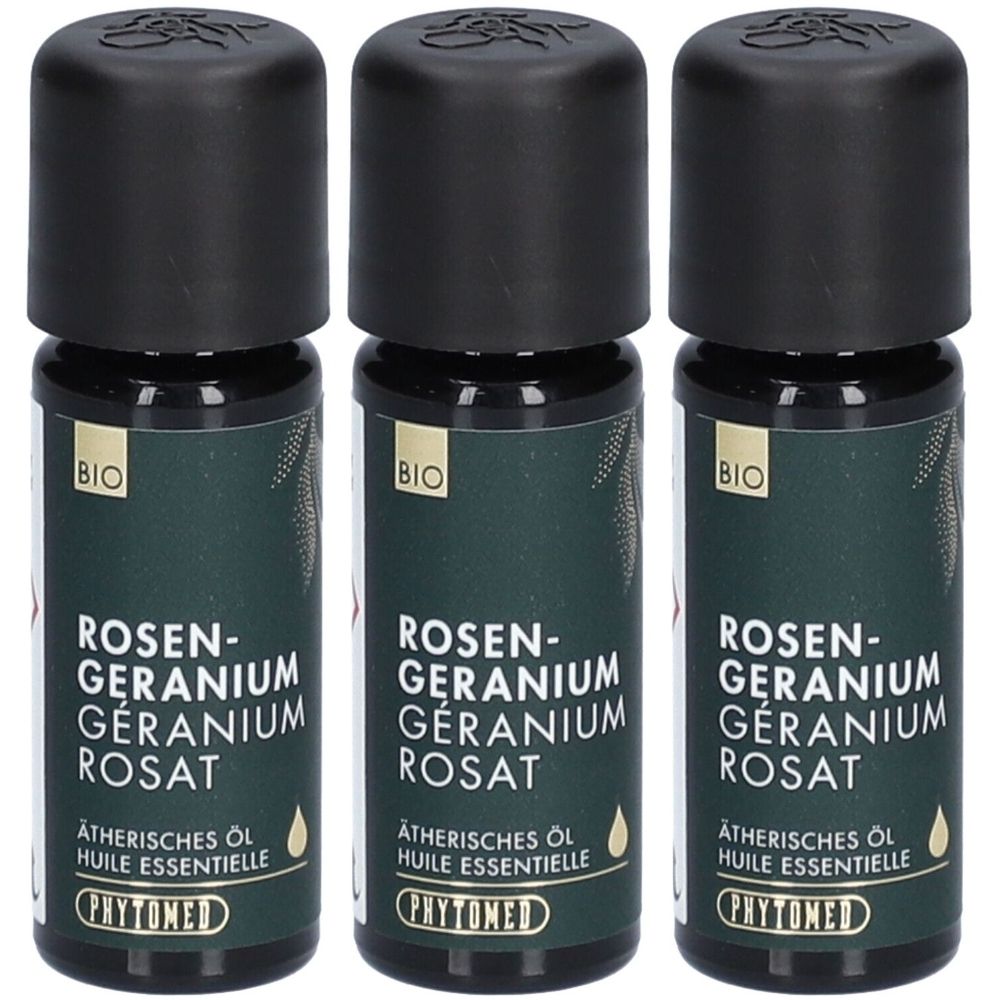 Drei Flaschen mit schwarzem Deckel. Aufschrift: Rosen-Geranium Rosat, Ätherisches Öl, PHYTOMED. BIO-Siegel.