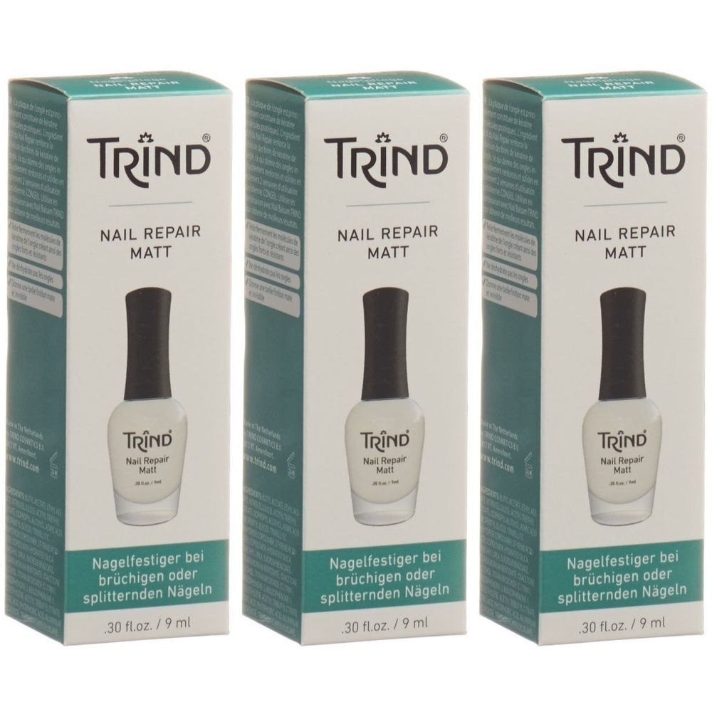 Drei Schachteln mit TRIND Nail Repair Matt. Jede Schachtel zeigt eine Flasche Nagellack und Text. Nagelfestiger bei brüchigen Nägeln.