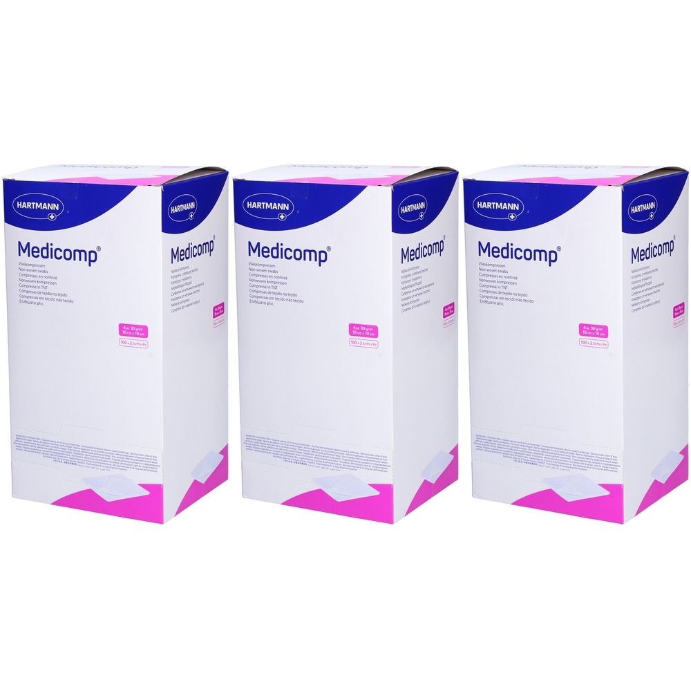 Trois boîtes blanches avec des accents bleus et roses. Le mot "Medicomp" est visible. Le logo "HARTMANN" est présent sur le dessus des boîtes.