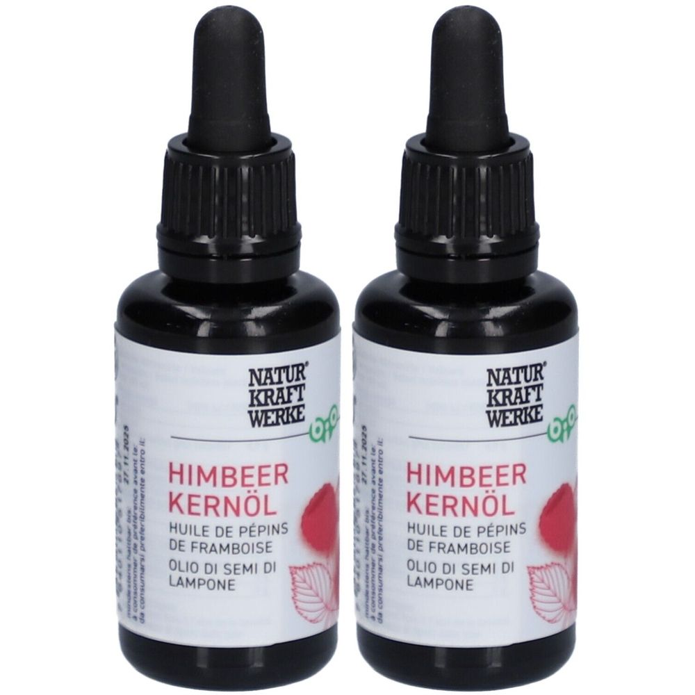 Zwei Flaschen Bio-Himbeerkernöl. Schwarze Flaschen mit Pipettenaufsatz. Etikett mit Produktnamen und Markennamen NATUR KRAFT WERKE.