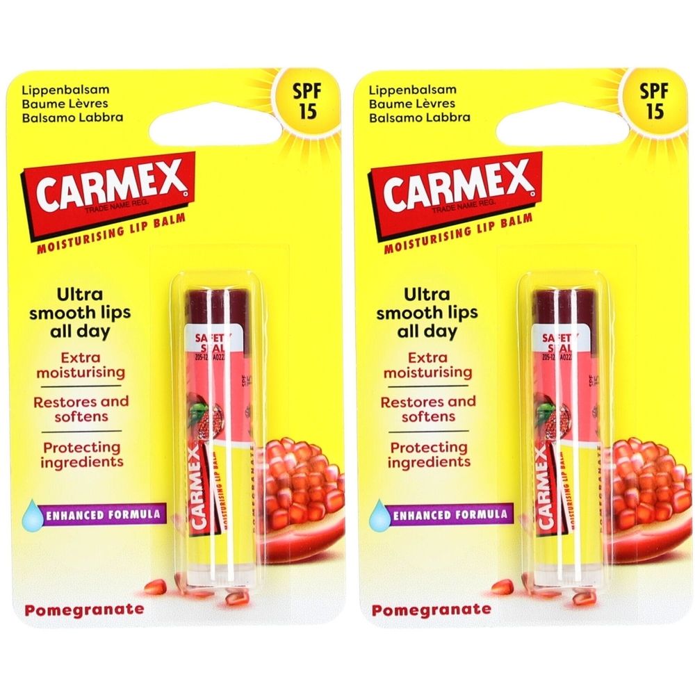 Twee CARMEX lippenbalsem verpakkingen. Gele kaart met product en granaatappelmotief. Tekst: SPF 15, Ultra gladde lippen, Extra hydraterend.