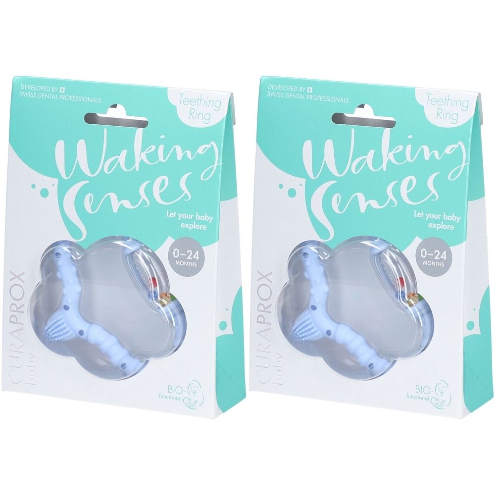 Zwei CURAPROX Beißringe in Verpackung. Hellblaues Design, transparentes Element. Aufschrift: Waking Senses, 0-24 Monate.