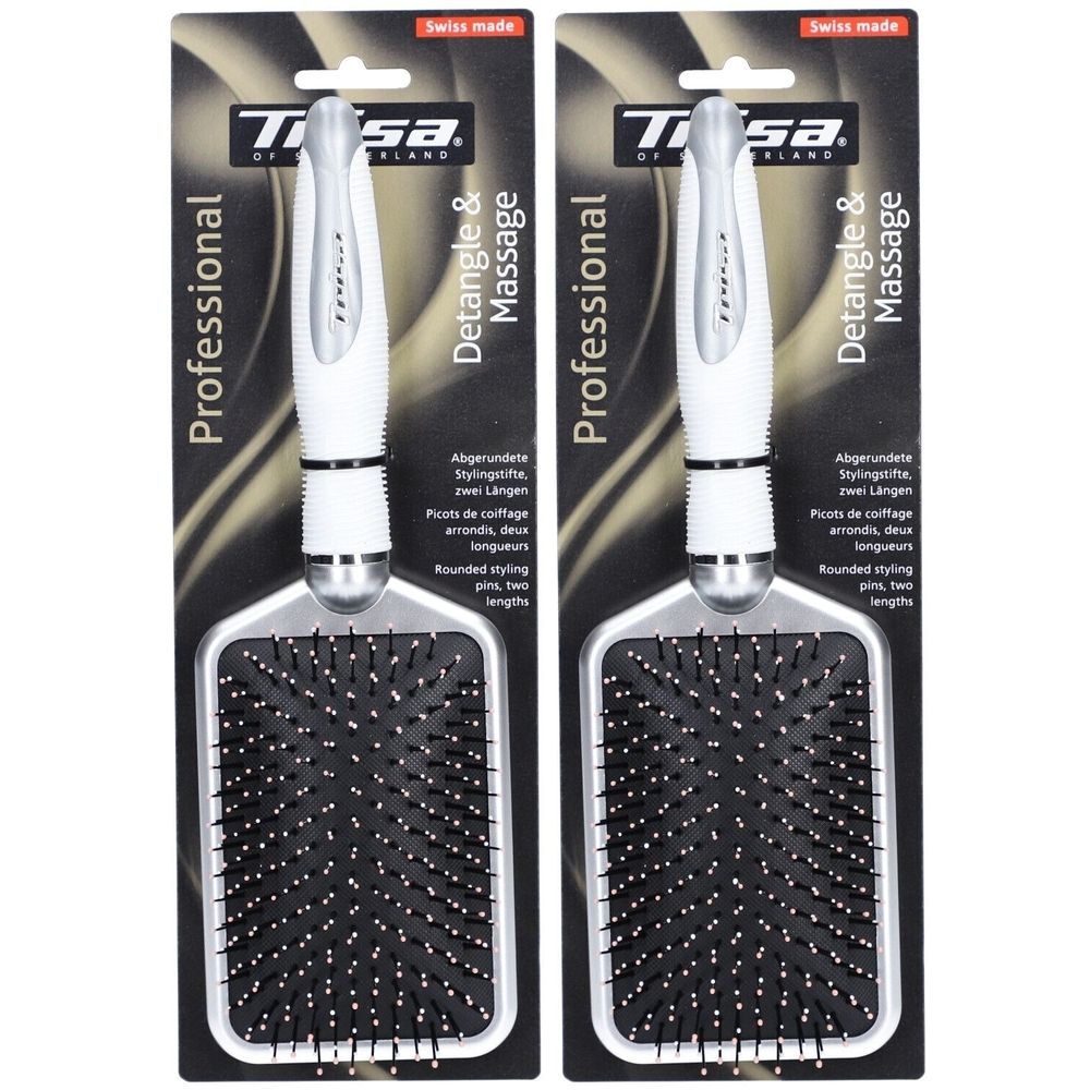 Zwei Haarbürsten auf Verpackung. Schwarze Borsten, weißer Griff. Aufschrift: Professional, Detangle & Massage, Swiss made.