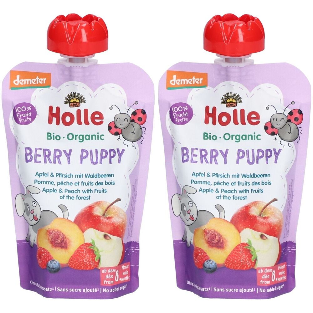 Zwei Quetschbeutel mit rotem Verschluss. Aufschrift: Holle Bio Berry Puppy, Apfel, Pfirsich und Waldfrüchte. Demeter-Siegel.
