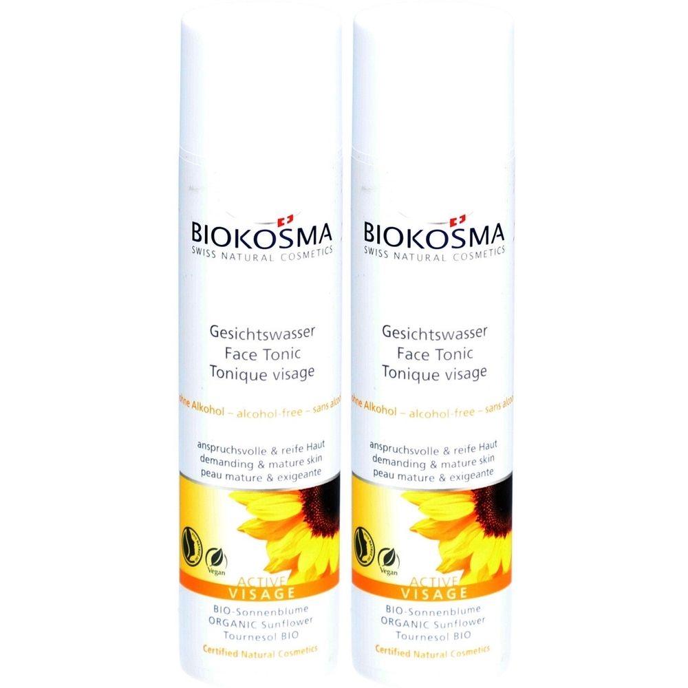 Zwei weiße Flaschen mit Etiketten. Aufschrift: BIOKOSMA, Gesichtswasser, Face Tonic, Tonique visage. Abbildung einer Sonnenblume.