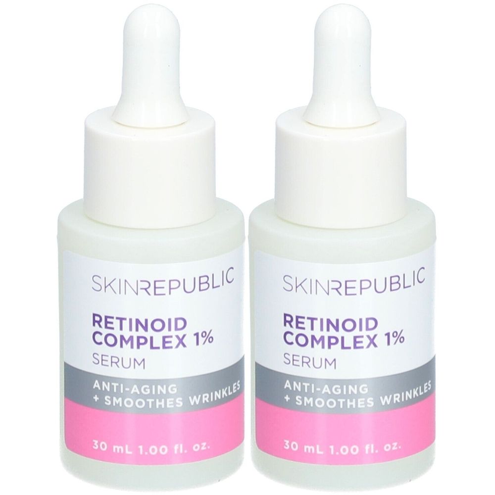 Deux flacons de sérum Skin Republic Retinoid. Flacons blancs avec compte-gouttes. Inscription : Retinoid Complex 1%, anti-âge, lisse les rides.