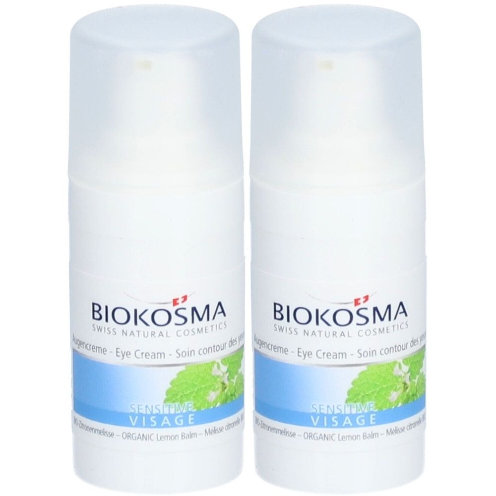 Deux flacons blancs avec étiquette BIOKOSMA. Inscription: Eye Cream, Sensitive Visage. Décor de menthe.