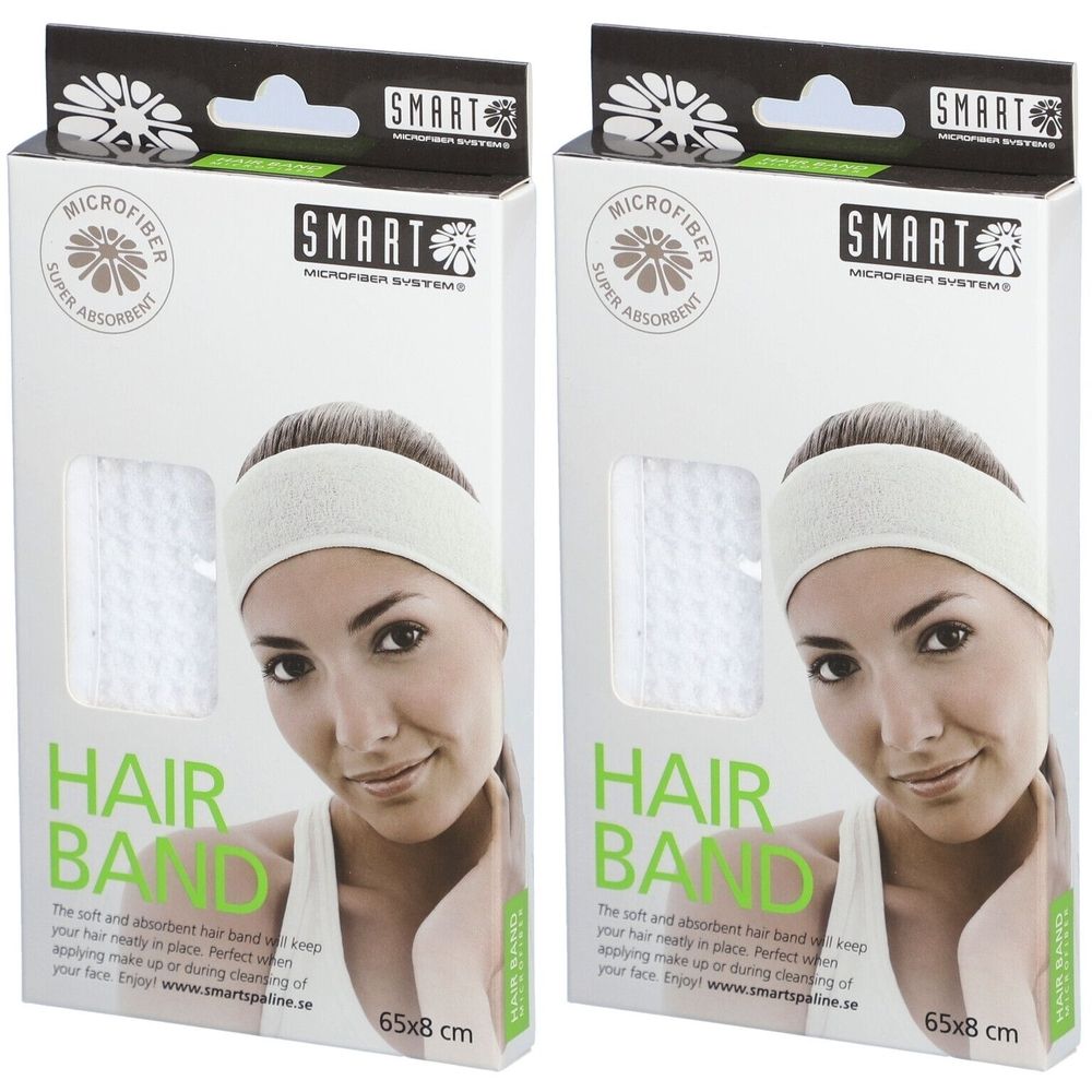 Zwei weiße Haarband-Verpackungen. Aufdruck: SMART, MICROFIBER, HAIR BAND. Maße: 65x8 cm. Produktabbildung: Frau mit Haarband.
