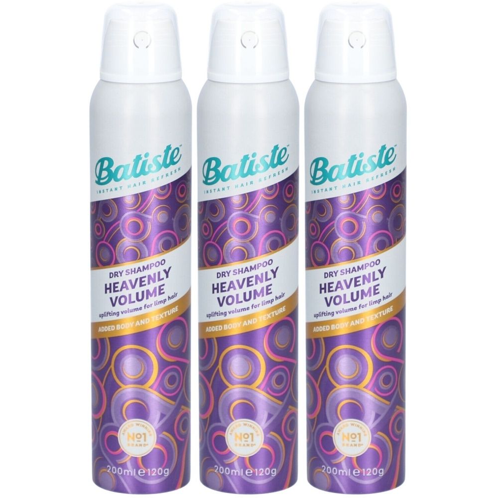 Drei Sprühflaschen mit weißem Deckel. Aufschrift: Batiste Dry Shampoo Heavenly Volume. Lila-goldenes Muster.