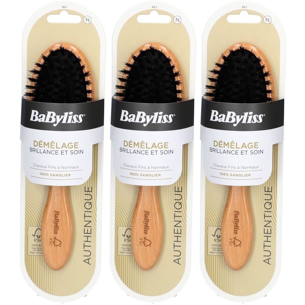 Drei BaByliss Holzbürsten mit Wildschweinborsten in Verpackung. Schwarze Borsten, Holzgriff, Produktname und Text auf der Verpackung.