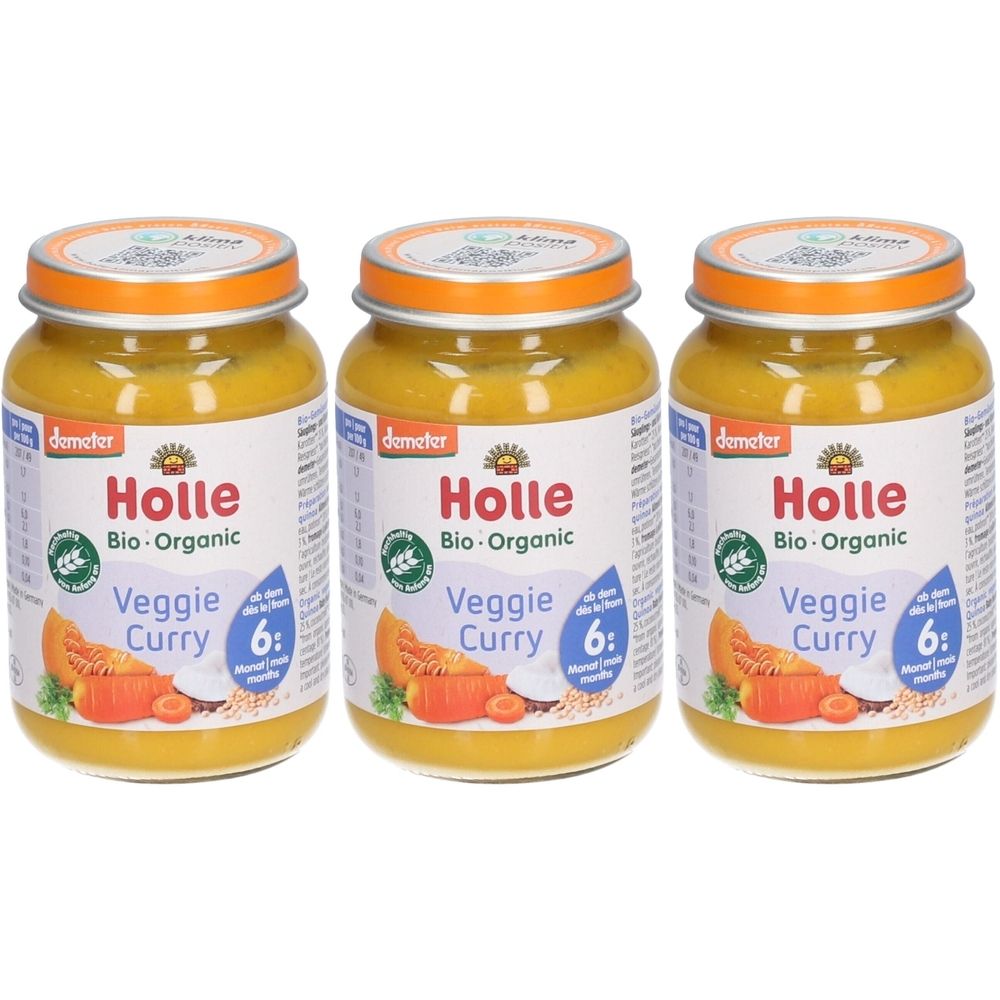 Drei Gläser HOLLE Bio-Gemüsecurry. Gläser mit Deckel, Etikett mit Logo und Aufschrift. Demeter-Siegel. Ab 6 Monaten.