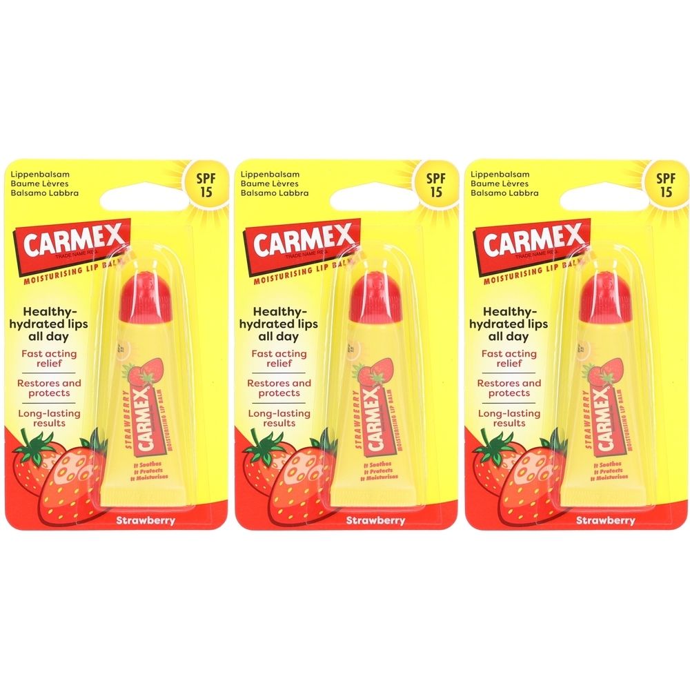 Drei CARMEX Lippenbalsam Erdbeere SPF15 in Verpackung. Gelbe Karte mit Produktinformationen und Erdbeer-Illustrationen.
