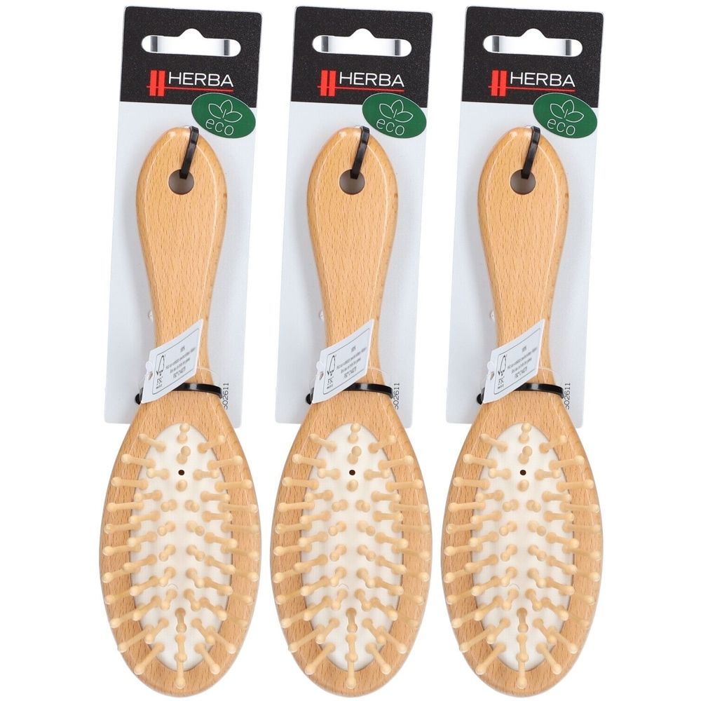 Drei ovale Holzbürsten mit Holzstiften. Griffe aus hellem Holz. Verpackung mit schwarzem Aufhänger und Logo "HERBA".