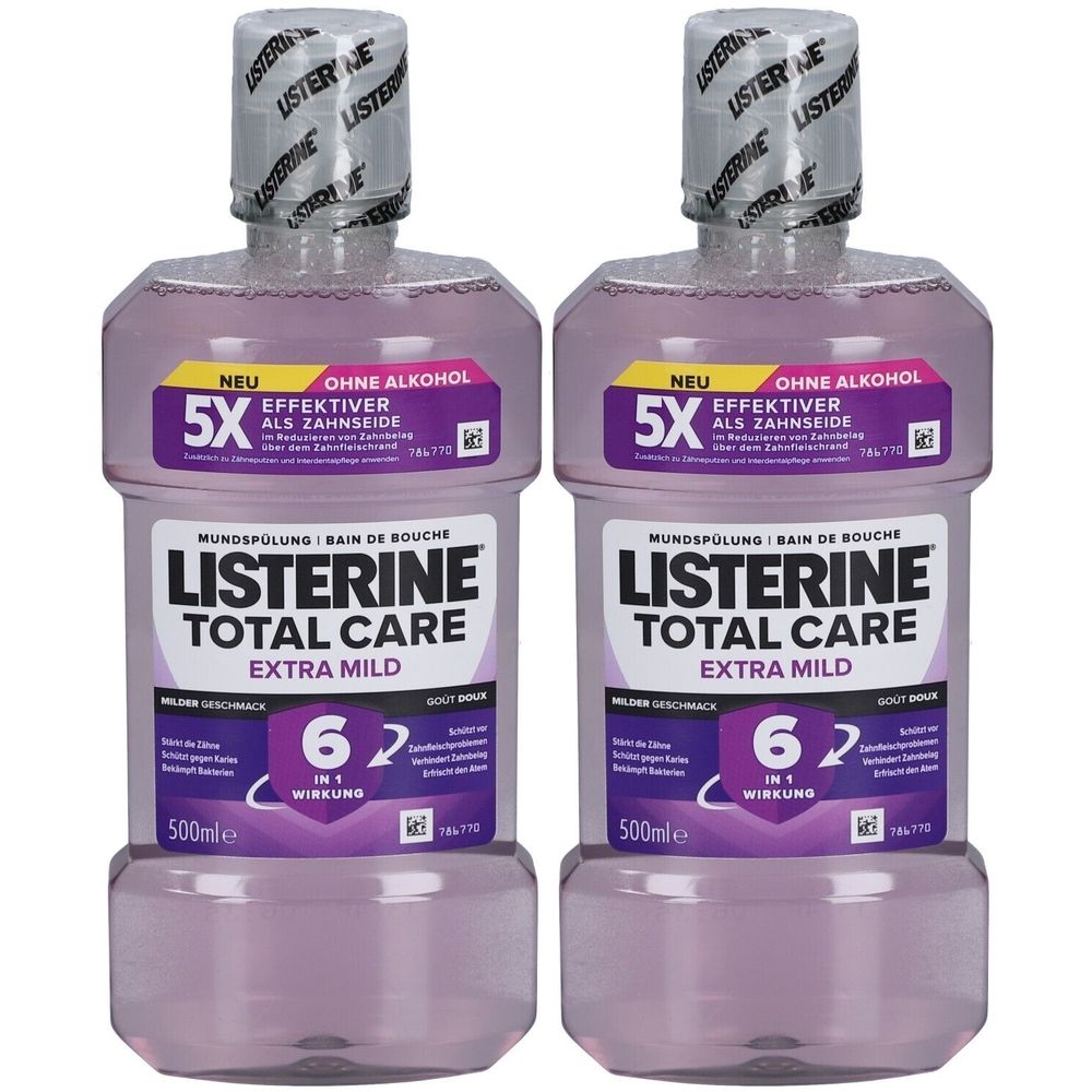 Zwei Flaschen Listerine Total Care Extra Mild Mundspülung. Lila Flüssigkeit in transparenten Flaschen. Aufschrift: 6 in 1 Wirkung, 500ml.