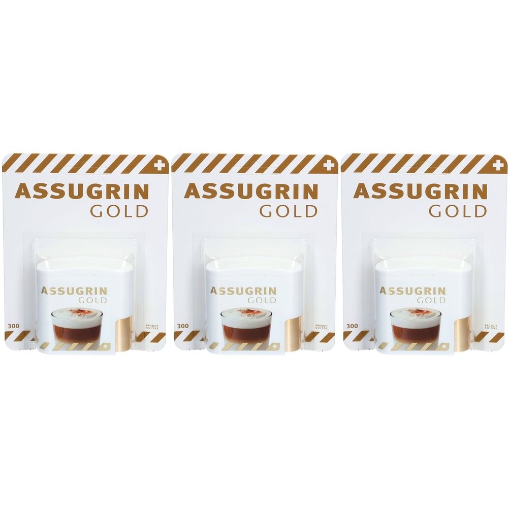 Drei Packungen Assugrin Gold Süßstoff-Tabletten. Jede Packung zeigt das Produkt in einem Becher. Der Markenname ist deutlich sichtbar.