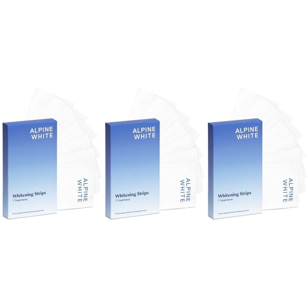 Drei Schachteln mit "ALPINE WHITE Whitening Strips". Daneben liegen transparente Streifen. Auf den Schachteln steht "Whitening Strips".