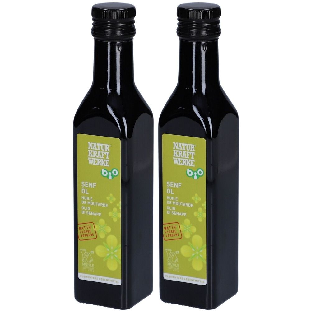 Deux bouteilles d'huile de moutarde bio. Bouteilles noires avec étiquettes vertes. Inscription : NATUR KRAFT WERKE, SENF ÖL, BIO.