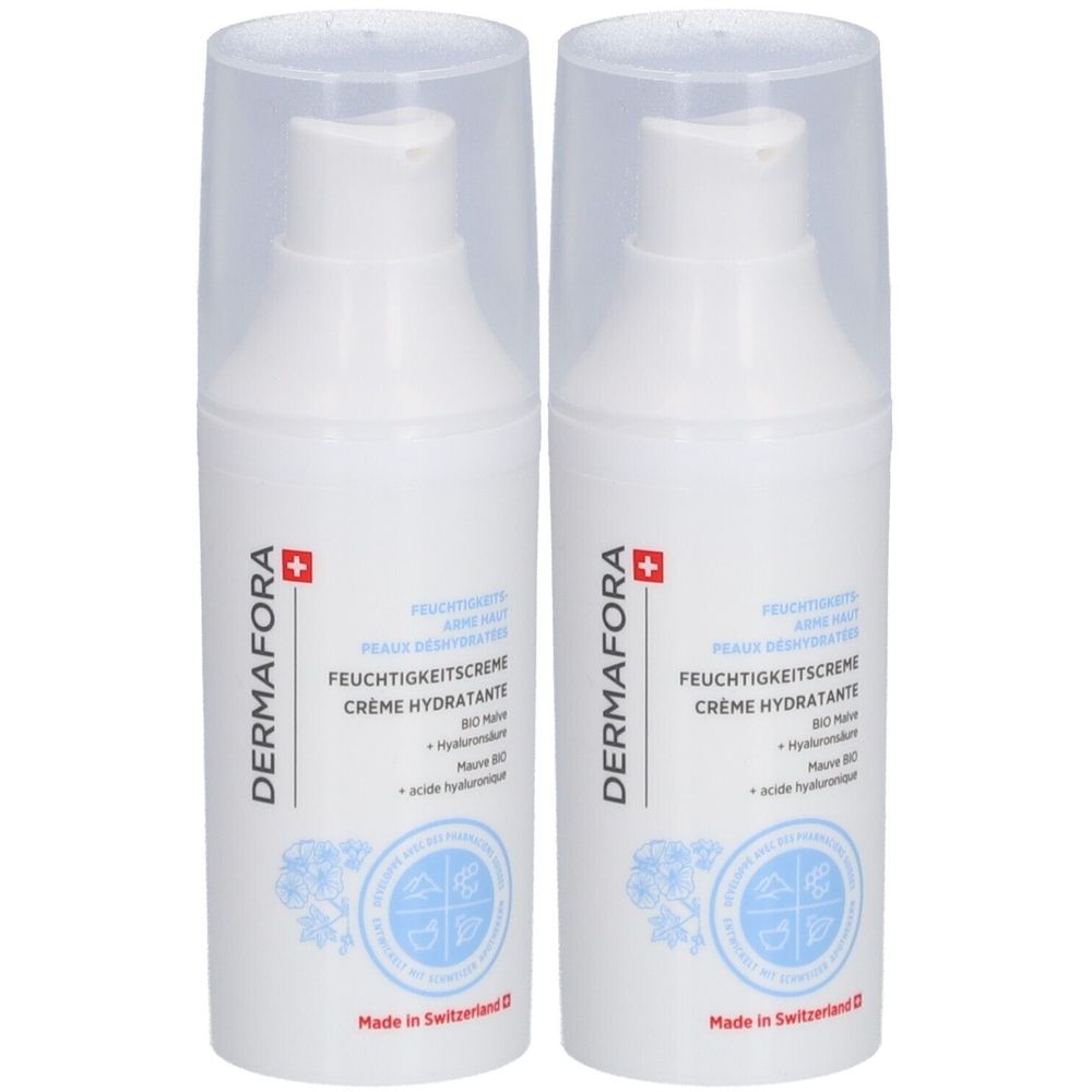 Zwei weiße Spenderflaschen mit transparenten Deckeln. Aufschrift: DERMAFORA Feuchtigkeitscreme, Creme hydratante. Hergestellt in der Schweiz.
