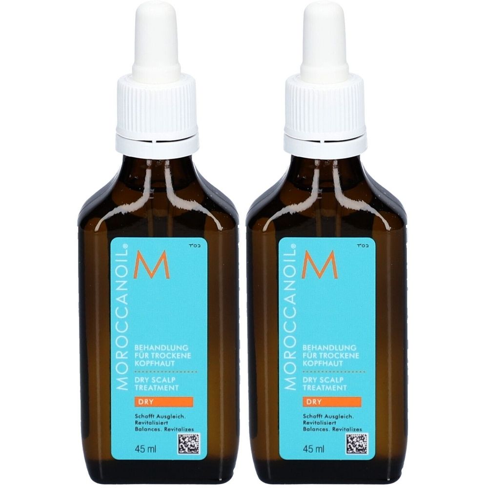 Zwei braune Flaschen mit weißem Deckel und Pipette. Auf blauem Etikett steht "MOROCCANOIL" und "BEHANDLUNG FÜR TROCKENE KOPFHAUT".