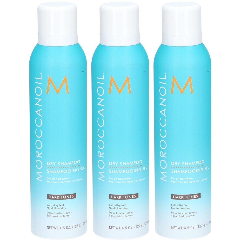 Drei blaue Sprühflaschen mit weißem Deckel. Aufschrift: Moroccanoil Dry Shampoo, Dark Tones. Nettogewicht: 4,5 oz (127 g).