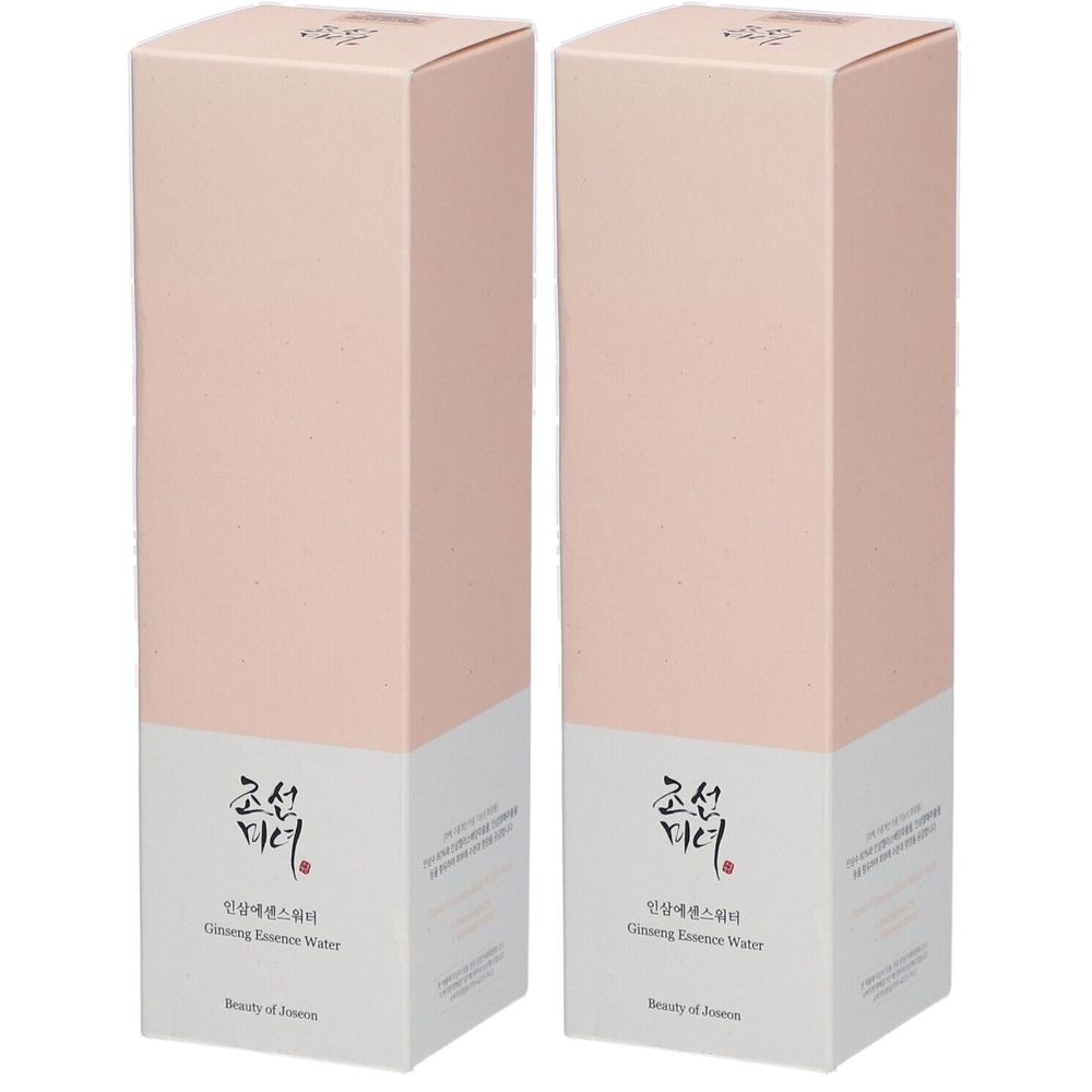 Zwei rechteckige, rosafarbene Produktverpackungen. Auf der weißen Unterseite steht koreanischer Text und "Ginseng Essence Water".