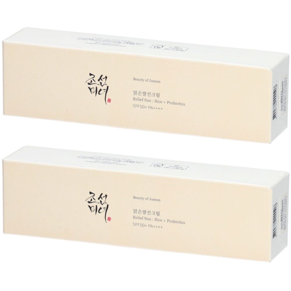 Zwei rechteckige, cremefarbene Produktverpackungen. Aufschrift: Beauty of Joseon, Relief Sun Rice Probiotics SPF50+.