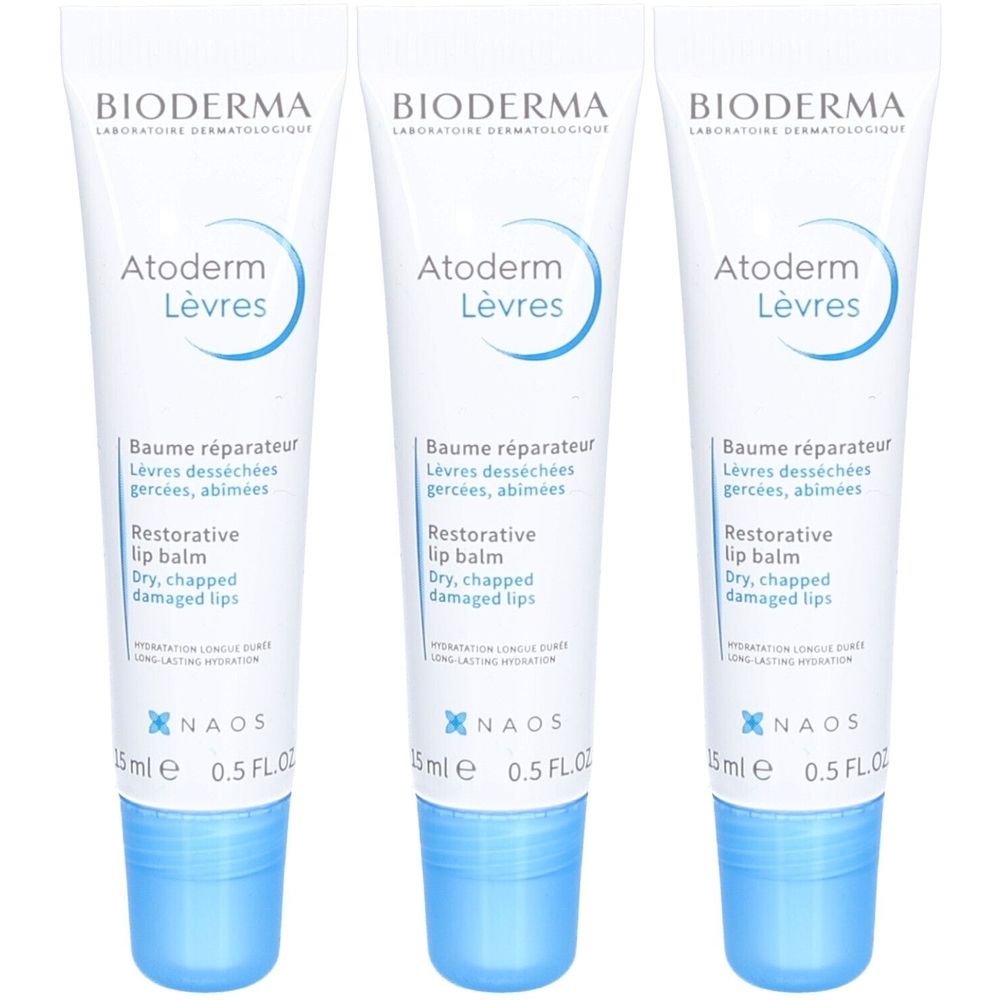 Drei Tuben Lippenbalsam. Aufschrift: BIODERMA Atoderm Lèvres, Baume réparateur, Restorative lip balm. Blaue Kappe, weiße Tube.