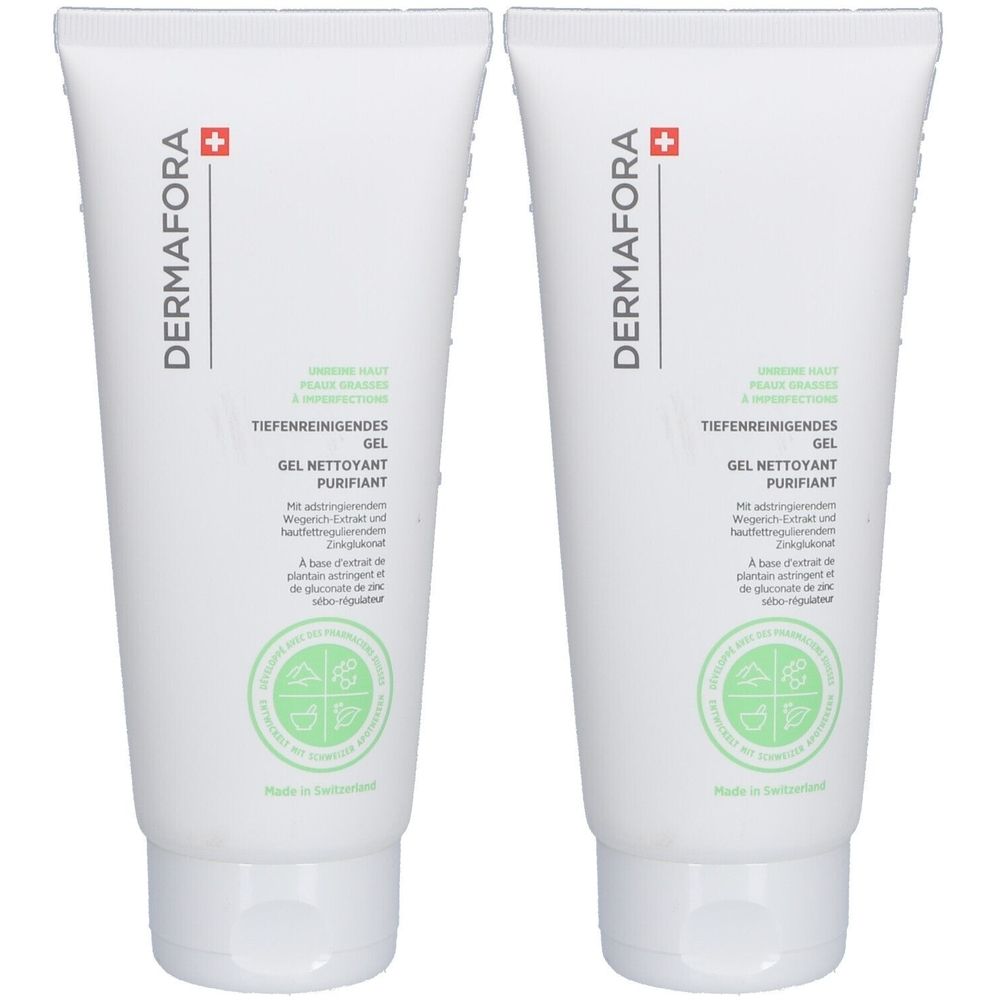 Zwei weiße Tuben mit grünem Aufdruck. Auf jeder Tube steht "DERMAFORA" und "Tiefenreinigendes Gel". Schweizer Qualität.