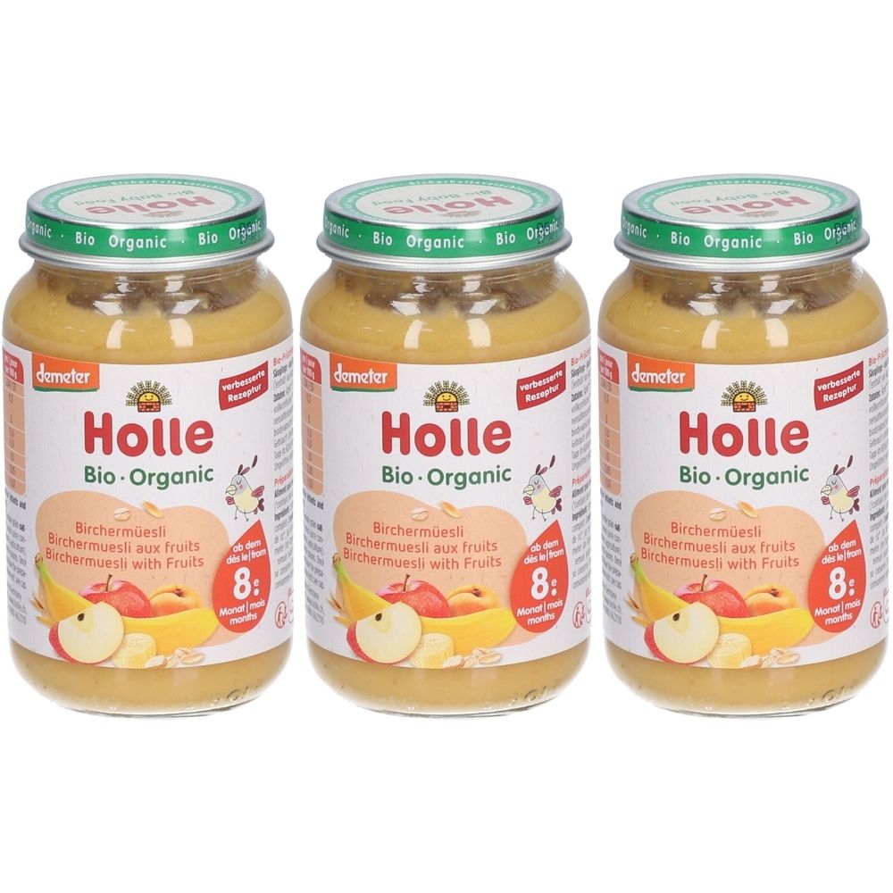 Drei Gläser Holle Bio-Organic Birchermüsli mit Früchten. Gläser mit grünem Deckel, Etikett mit Produktabbildung und Schriftzug.