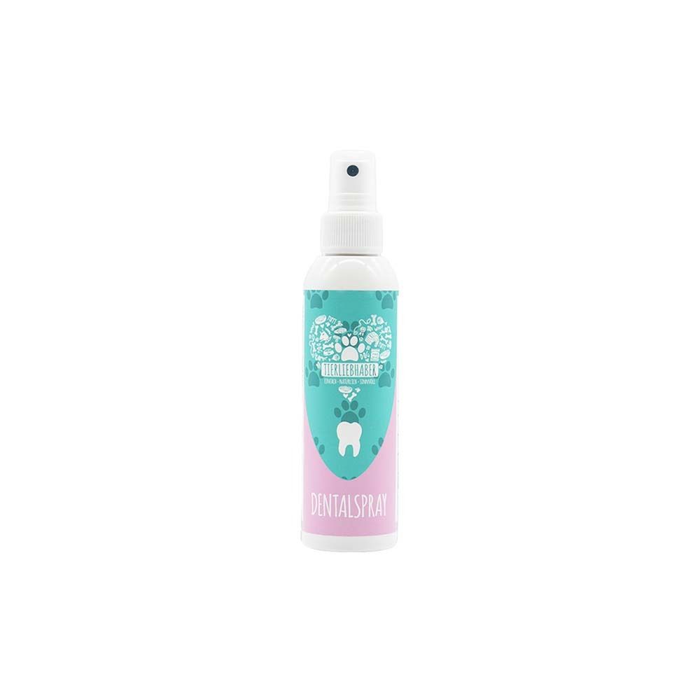 Zahn-Spray-Flasche. Weißer Sprühkopf, türkisfarbene und rosa Etiketten. Aufschrift: DENTALSpray.