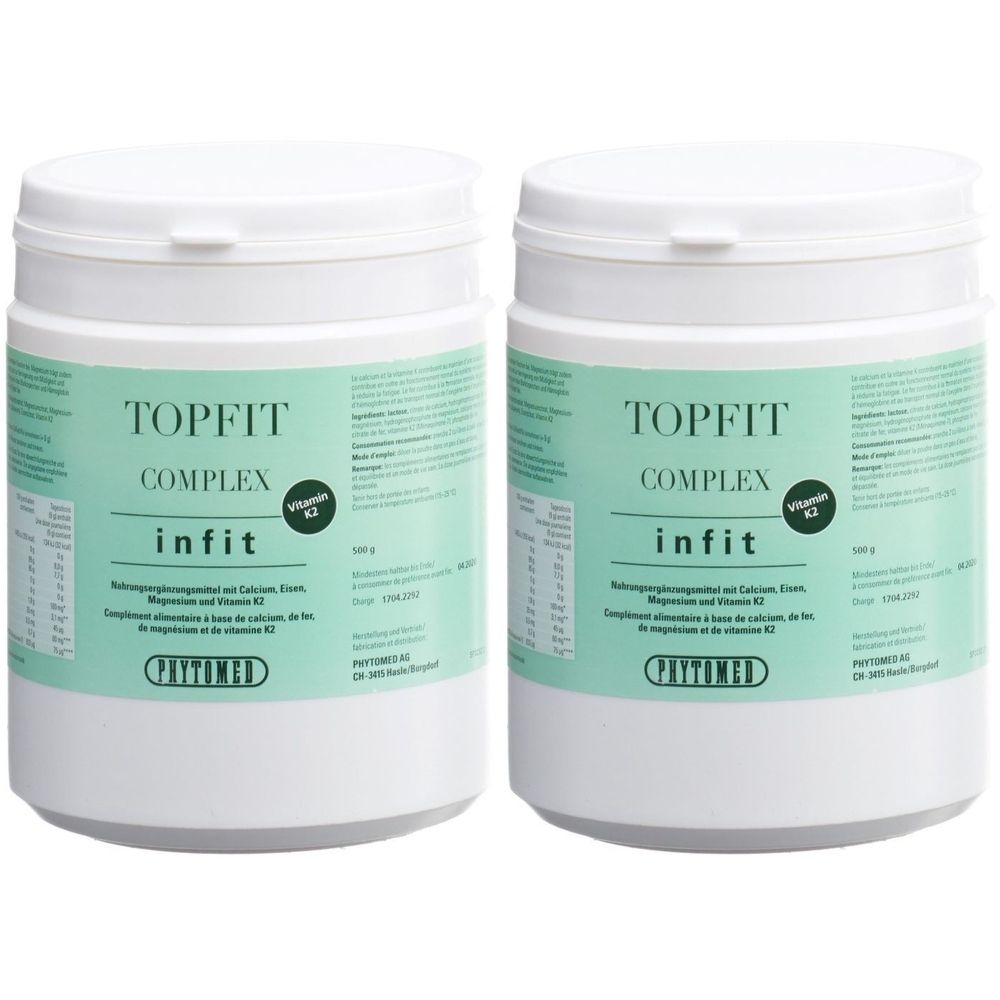 Zwei Dosen PHYTOMED Topfit-Komplex mit Vitamin K2. Weiße Behälter mit grünen Etiketten.