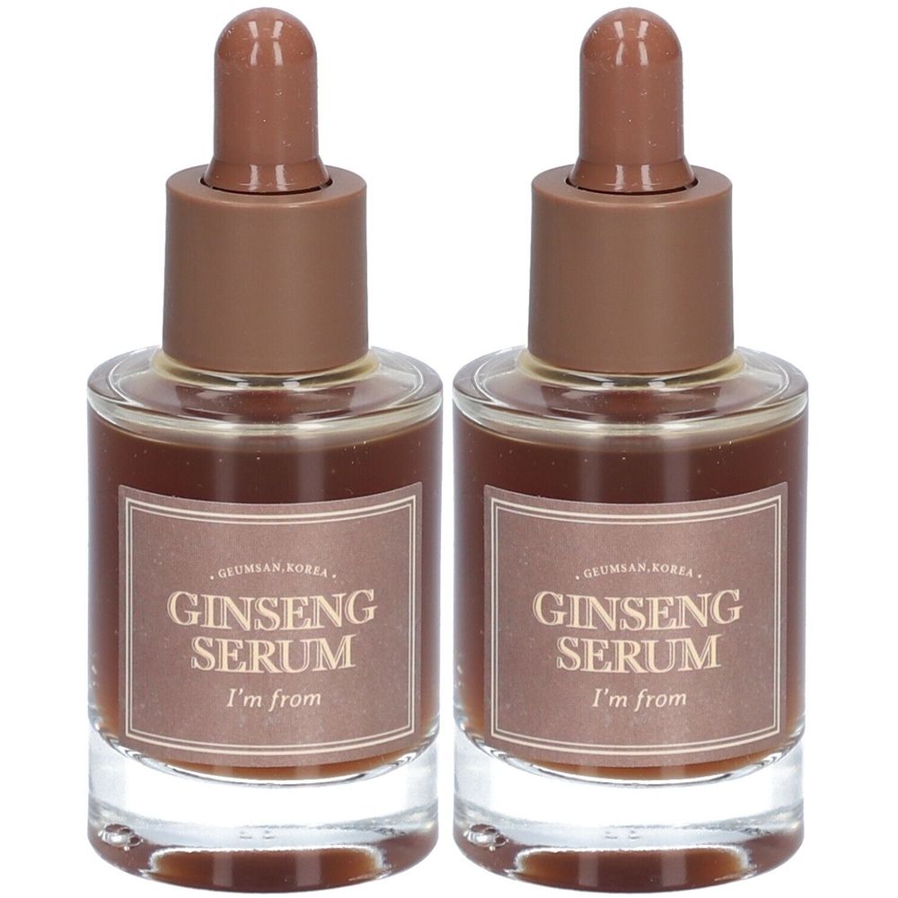 Zwei Glasflaschen mit braunem Serum. Auf den Etiketten steht "Ginseng Serum" und "I'm from". Braune Deckel mit Pipetten.