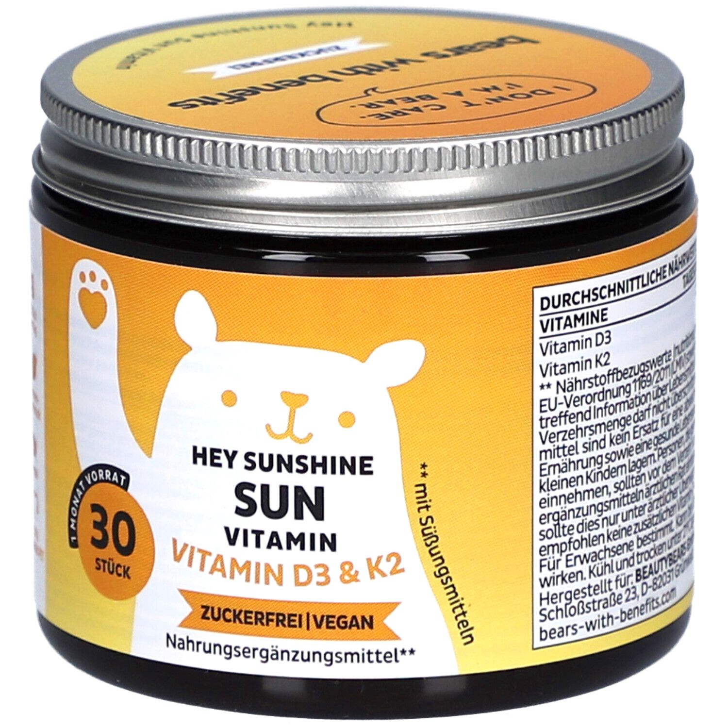 Dose mit Deckel. Aufschrift: HEY SUNSHINE SUN VITAMIN D3 & K2. 30 Stück. Zuckerfrei, vegan. Gelbes Etikett mit Bär.