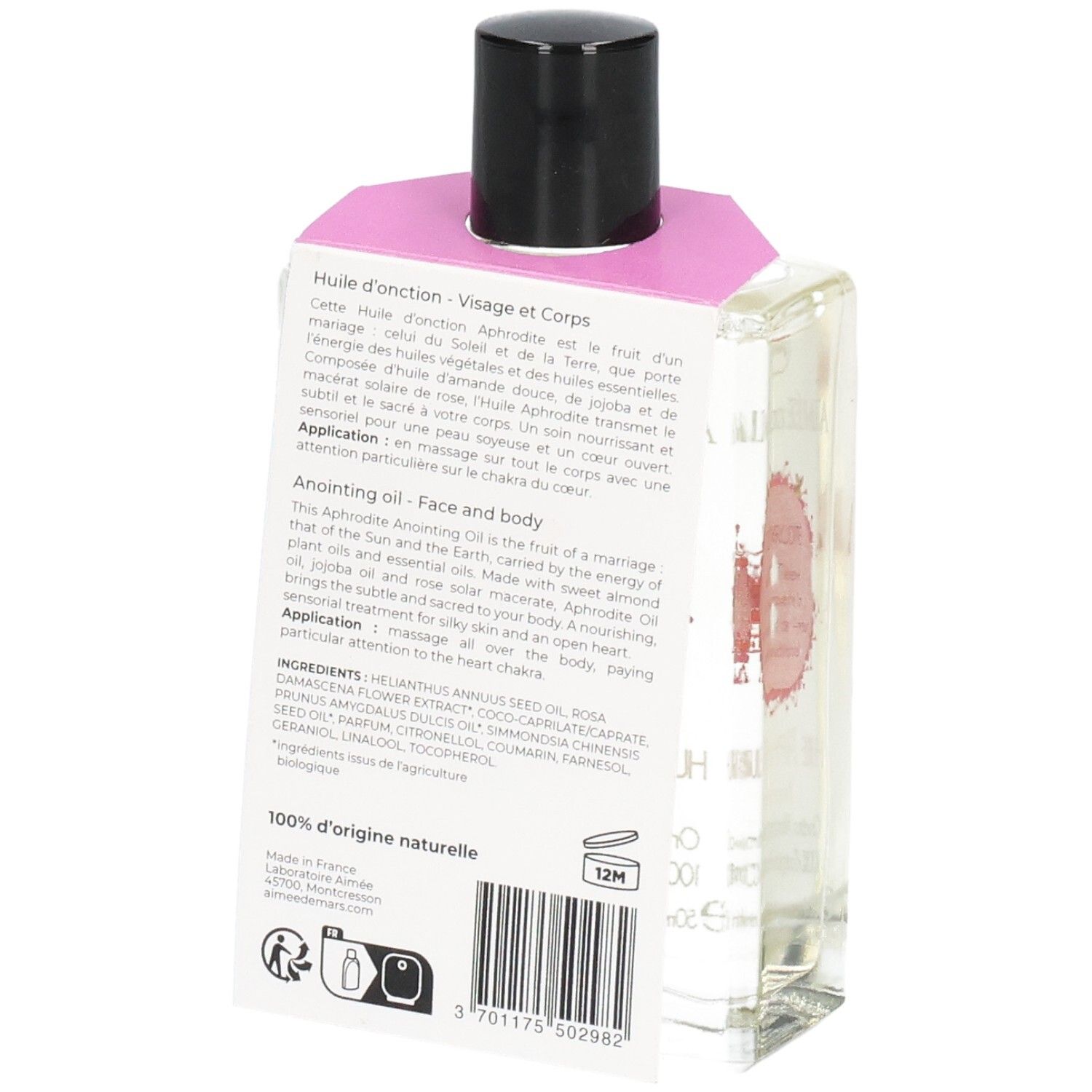 Glasflasche mit klarer Flüssigkeit, schwarzem Deckel und rosa Etikett. Rückseite mit Text und Barcode.