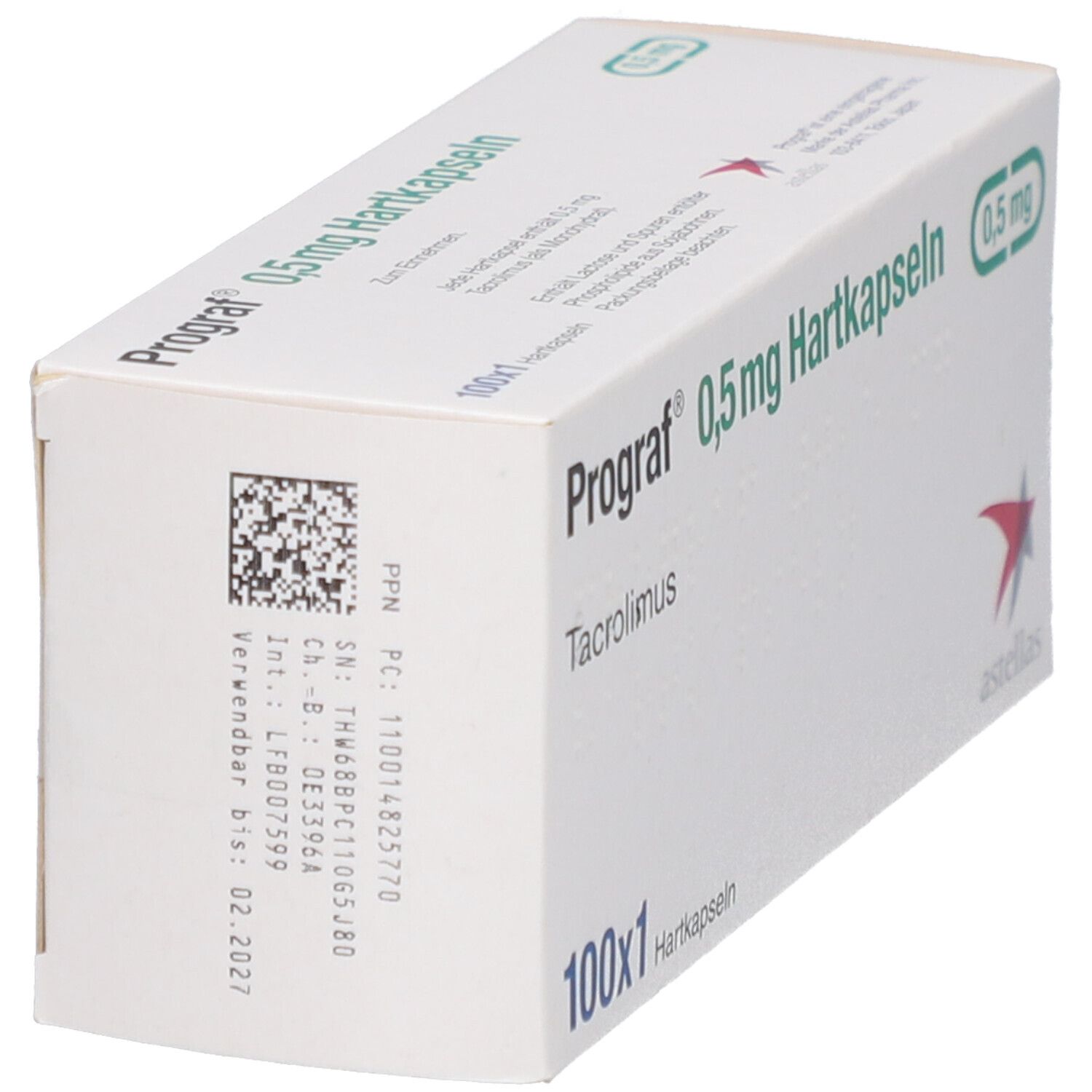 Schräg gestellte Prograf-Verpackung. Aufschrift 0,5 mg Hartkapseln. Enthält 100x1 Kapseln. Astellas-Logo.