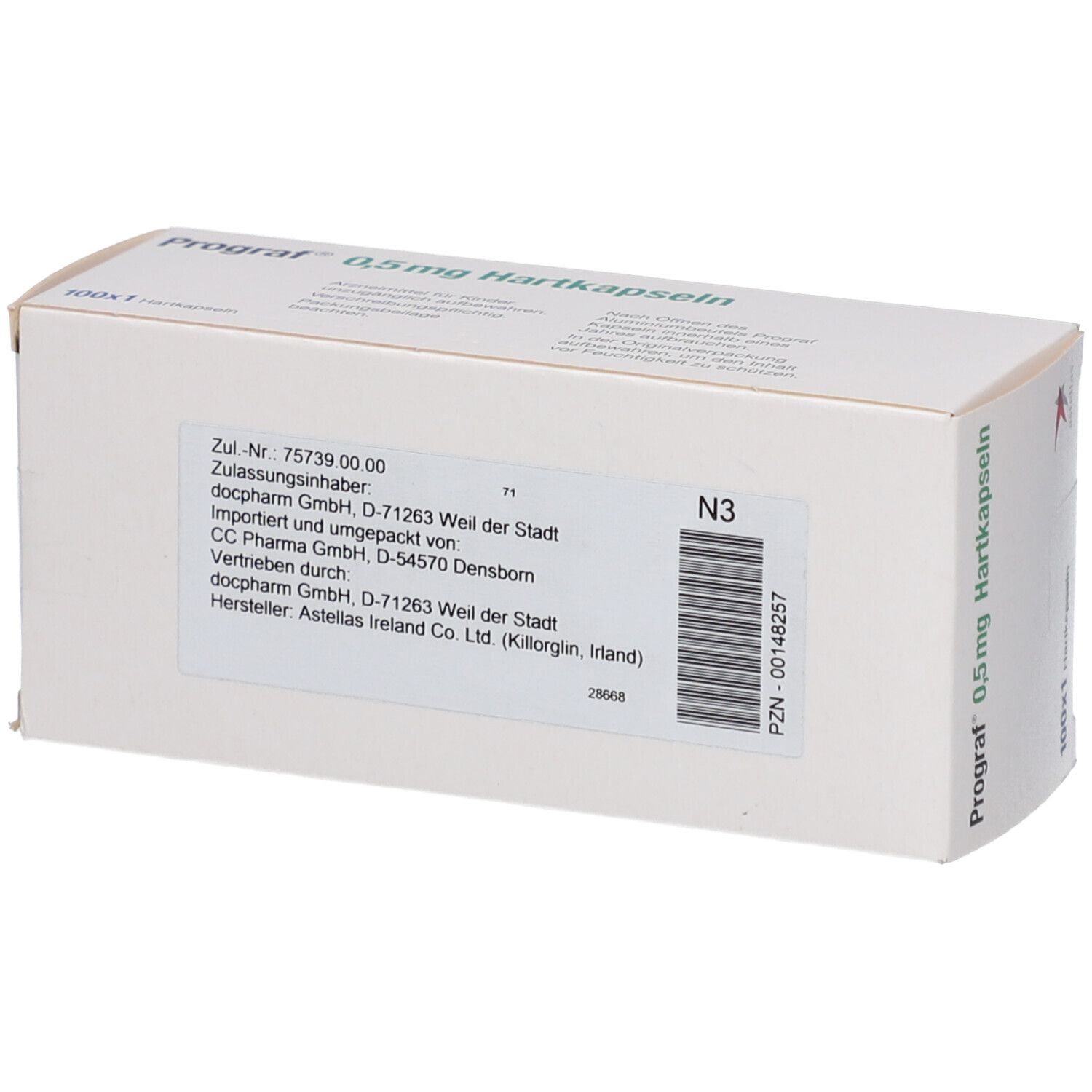 Prograf-Verpackung mit Aufschrift 0,5 mg Hartkapseln. Enthält 100x1 Kapseln. Barcode und Adressinformationen.