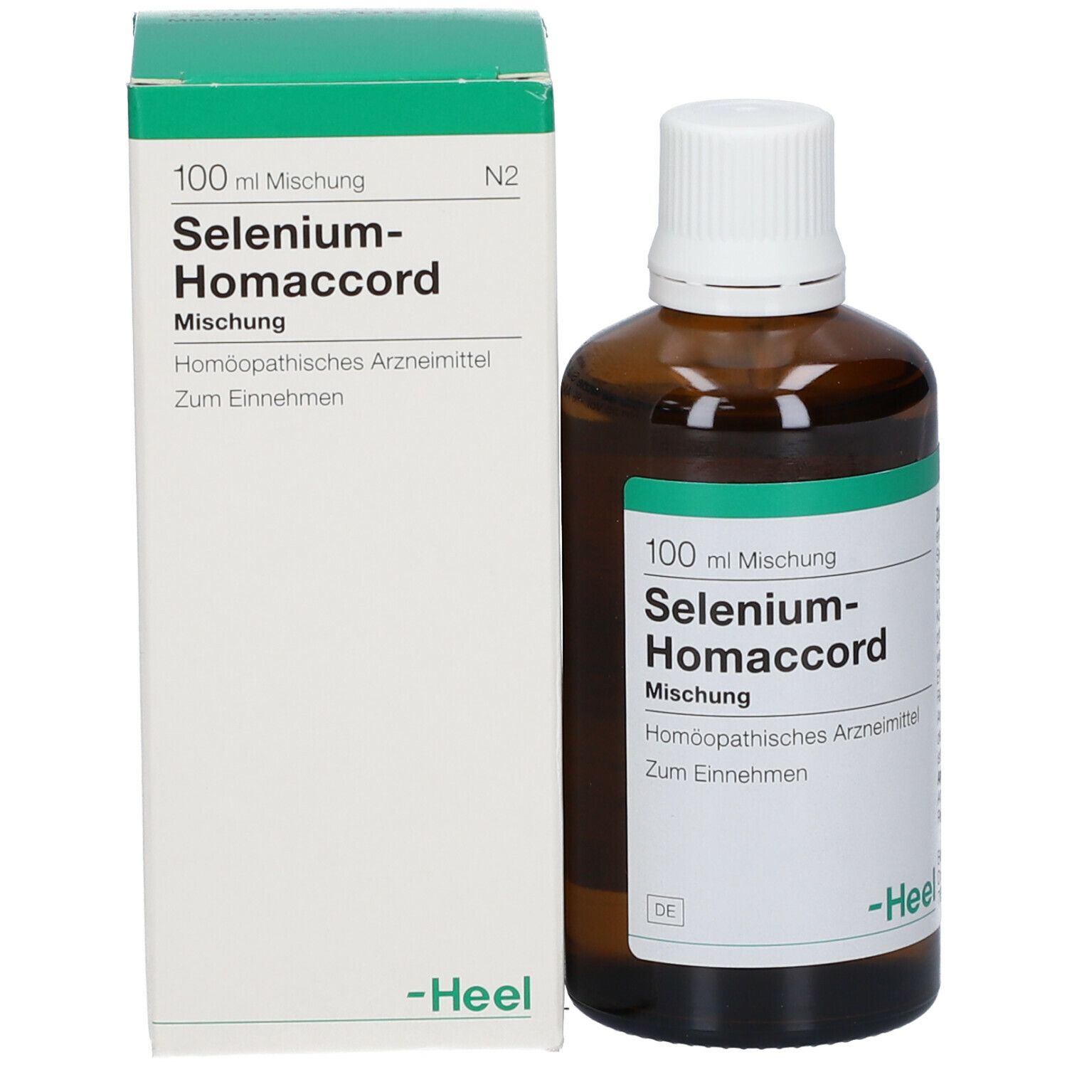 Braune Glasflasche und Schachtel. Auf der Flasche: Selenium-Homaccord Mischung. Auf der Schachtel: Selenium-Homaccord.