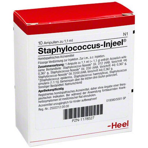 Schachtel mit "Staphylococcus-Injeel® Ampullen". Weiß mit rotem Deckel. Text in Deutsch. Marke "Heel".