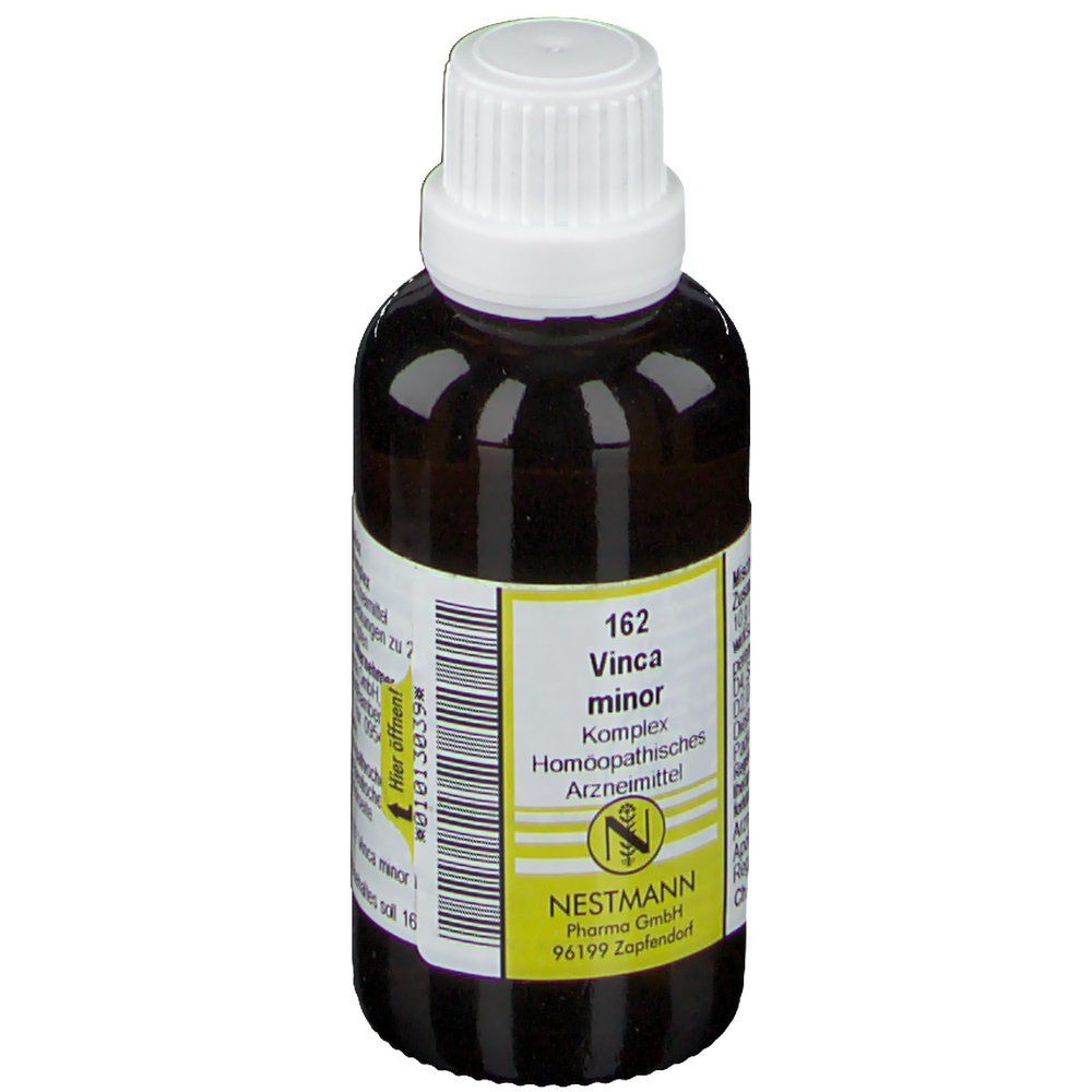 Braune Glasflasche mit weißem Verschluss. Etikett mit Produktnamen: 162 Vinca minor Komplex. Logo Nestmann Pharma. Homöopathisches Arzneimittel.