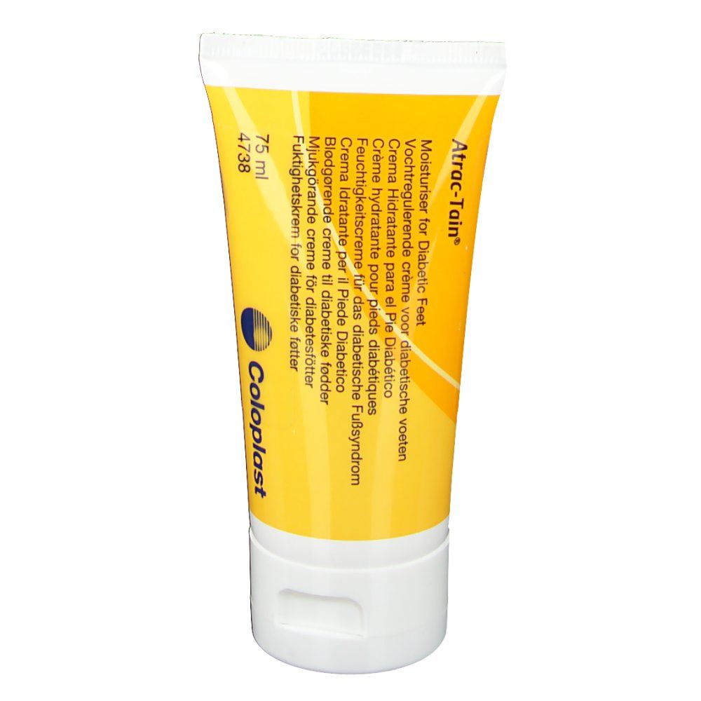 Creme-Tube, gelb-weiß. Aufschrift: Atrac-Tain, 75 ml, Coloplast. Text in mehreren Sprachen.