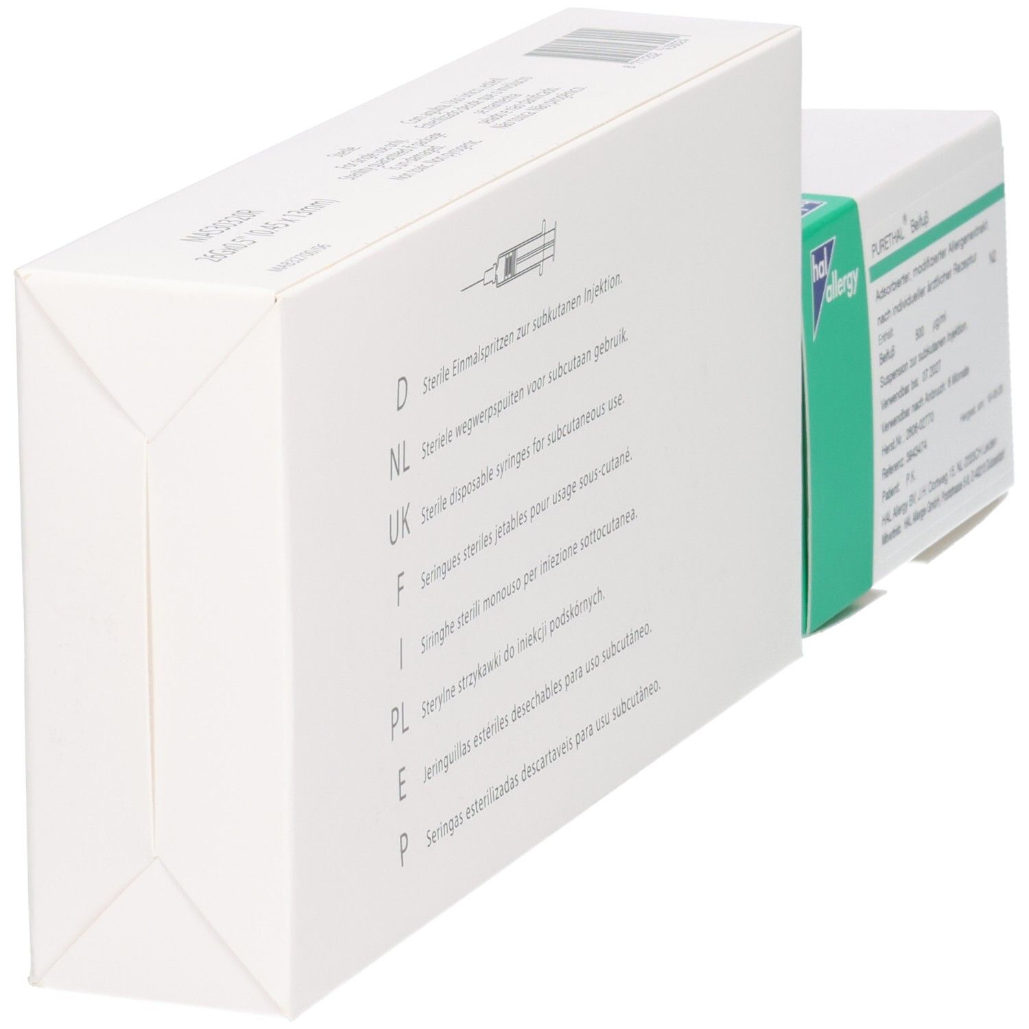 Zwei Packungen, schräg von vorne gezeigt: eine weiße Schachtel mit Spritzensymbol und mehrsprachigen Hinweisen, daneben eine kleinere grüne und weiße Schachtel.